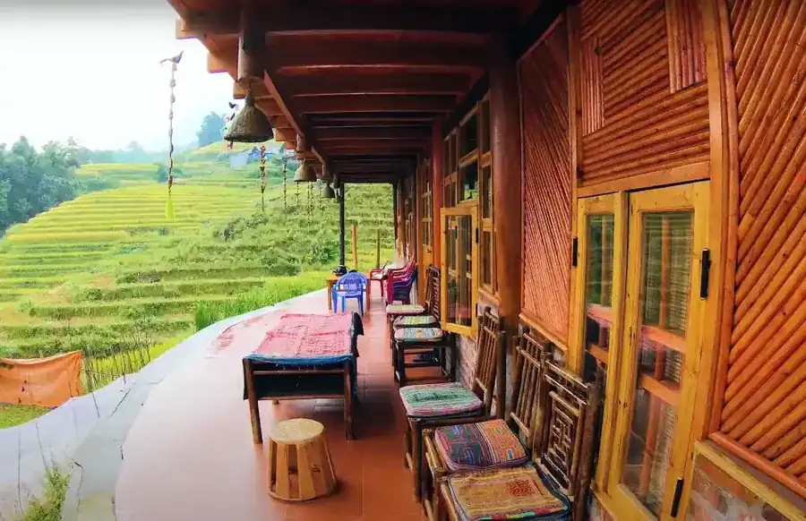 Hidden Village Homestay Journey — Sapa local family welcoming travelers into their hill tribe home for an authentic homestay